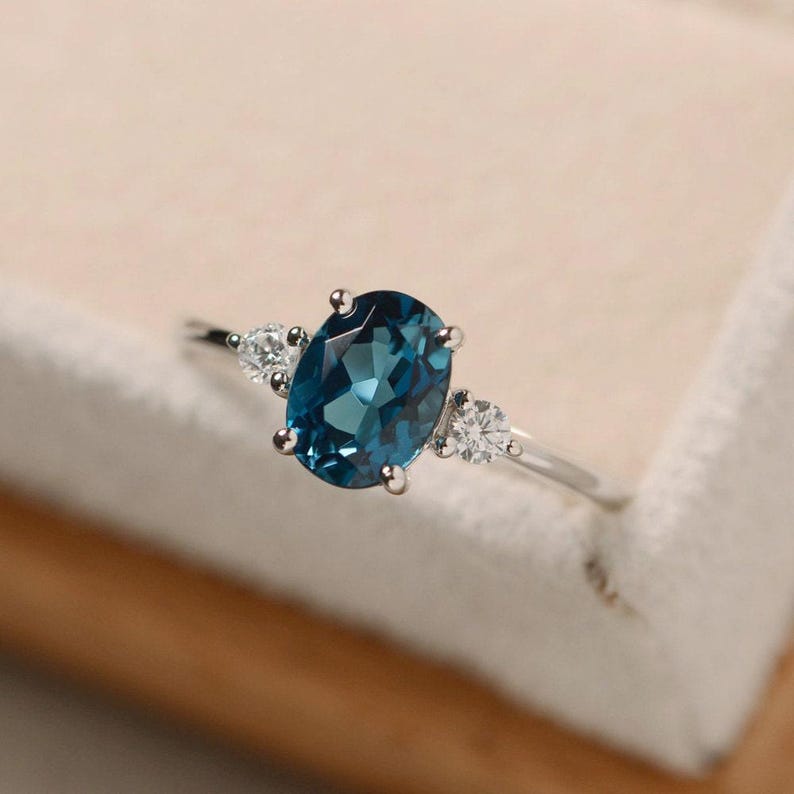 Oval Cut Blue Topaz Ring