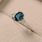 Oval Cut Blue Topaz Ring