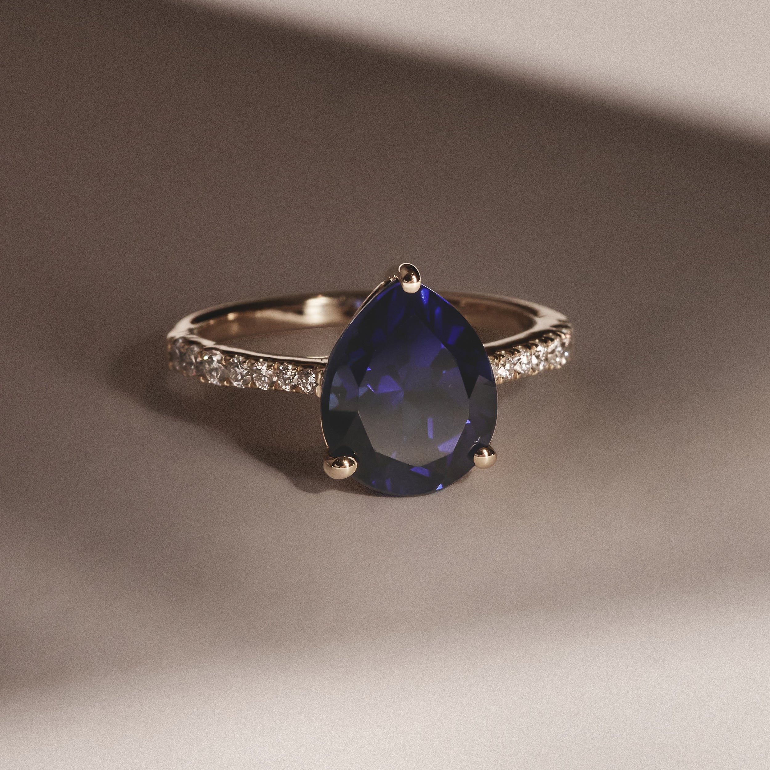 Blue Sapphire Pear Cut Ring in Gold